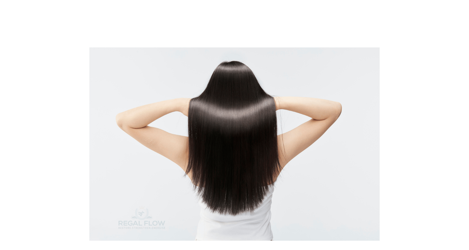 a woman with her hands in her black hair with regal flow logo