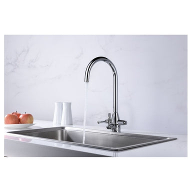 clearwater filter tap installed over a sink pouring water