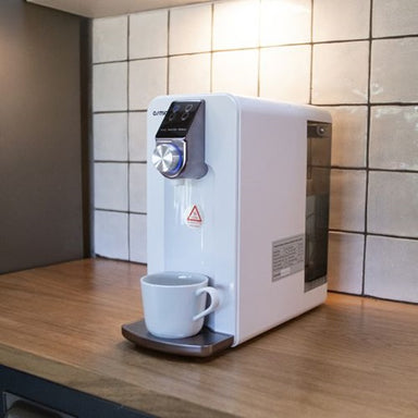 Countertop Dispenser with a cup of coffee