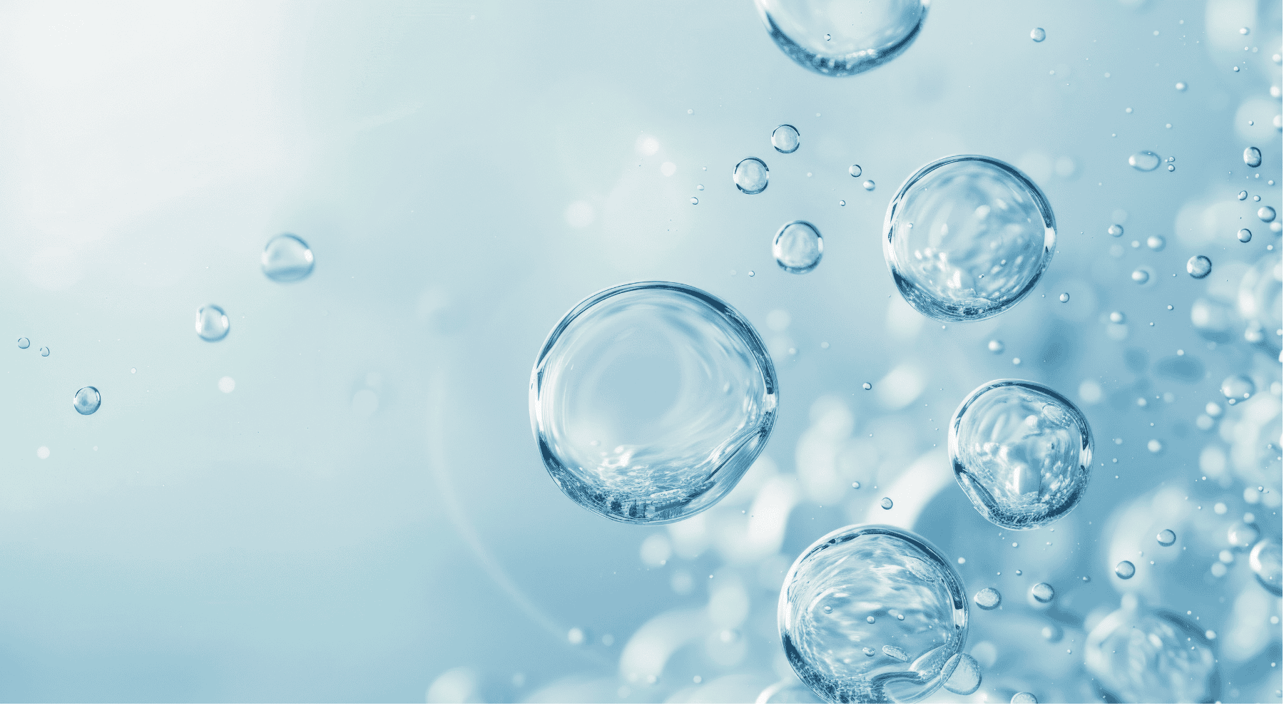 Close-up of water droplets on a blue background