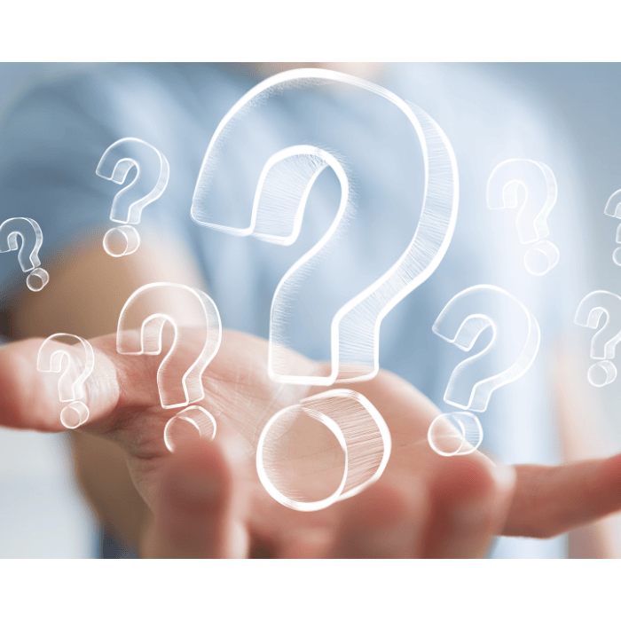 Question marks in a hand