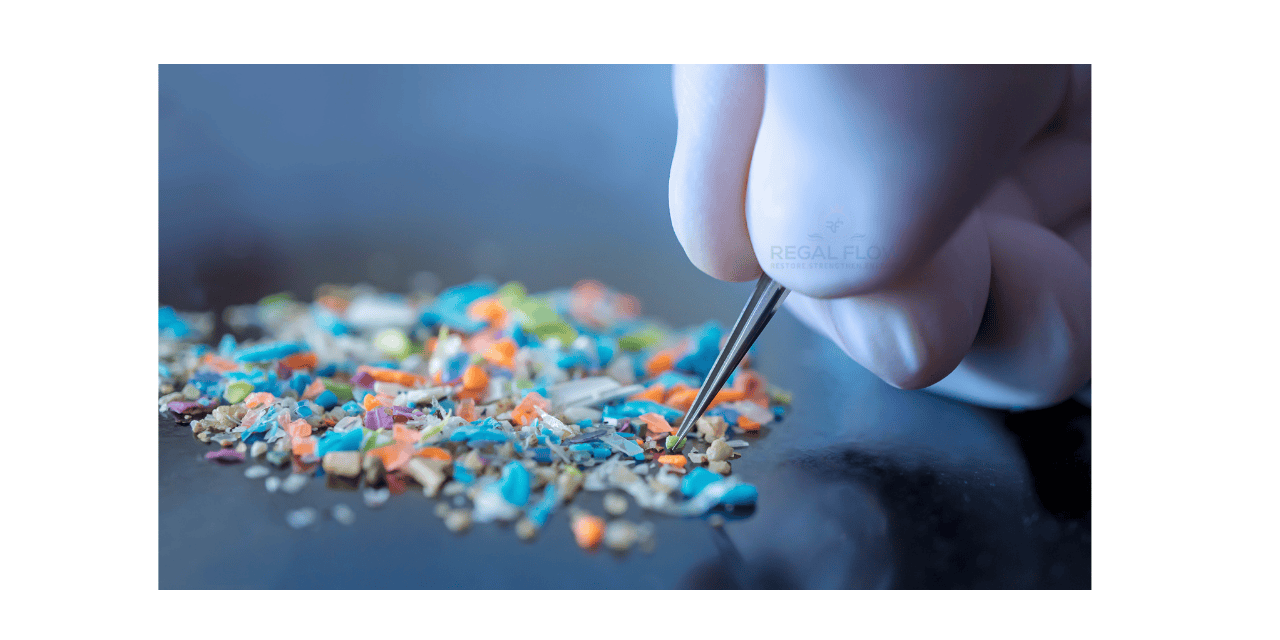 Microplastics being picked up by a hnad with tweezers 