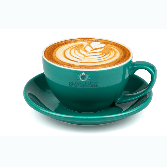 Cup of coffee in green cup with saucer