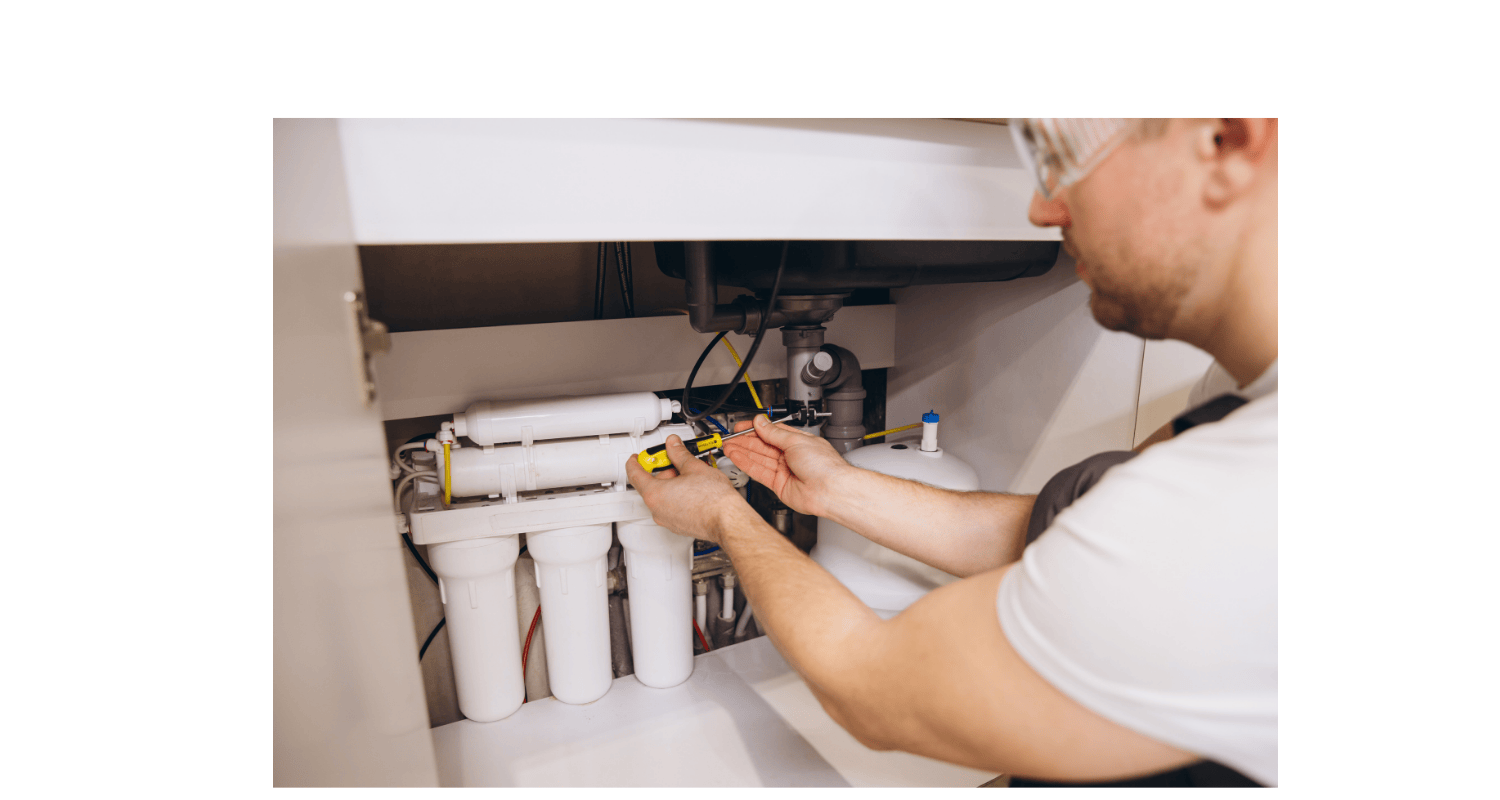Under sink reverse osmosis system and plumber