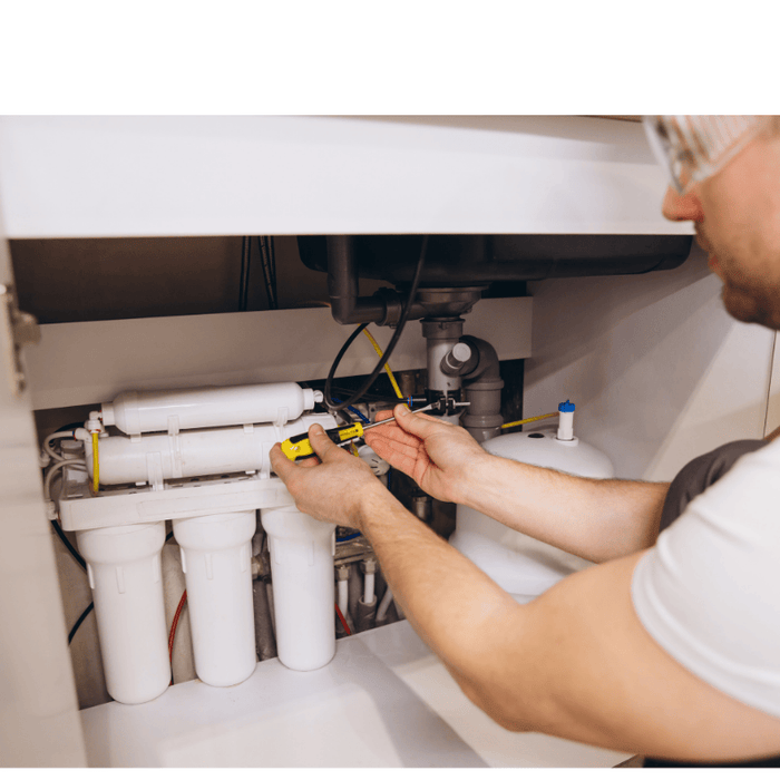 Under sink reverse osmosis system and plumber