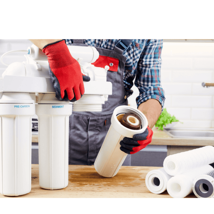 three water filters being changed