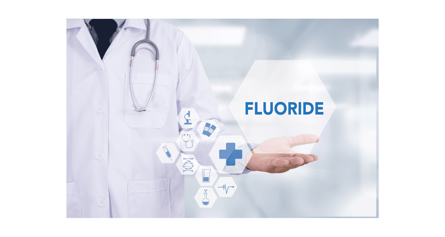 A fluoride symbol in a hand