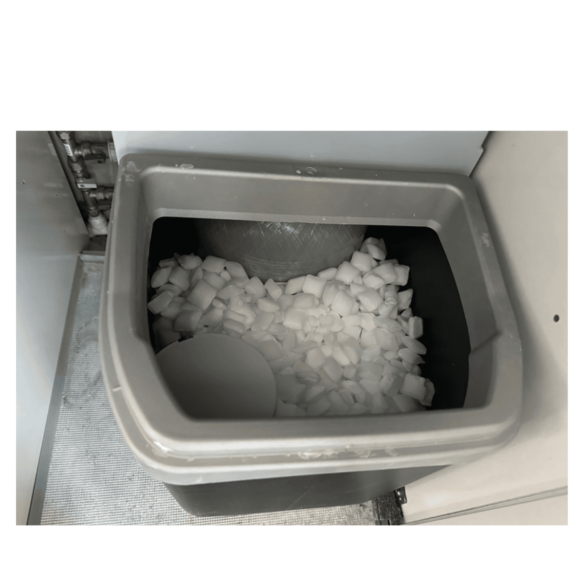 A Home Water Softener with Salt in