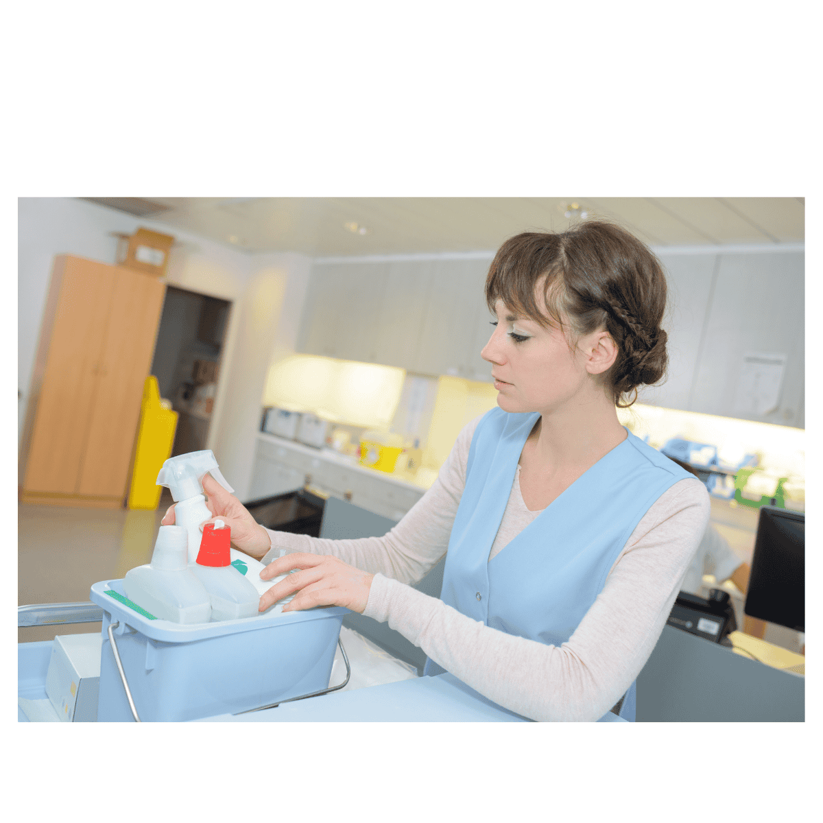 A woman with cleaning materials