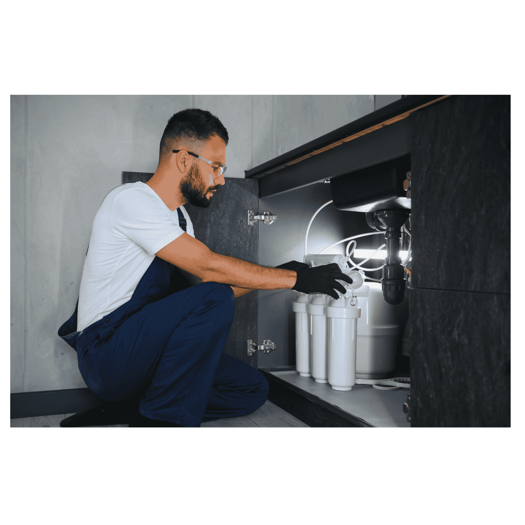 An engineer installing a reverse osmosis system