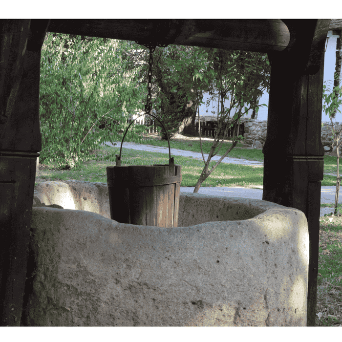 A bucket coming from a Well