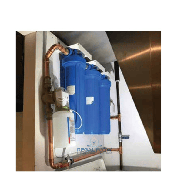 A whole house water filter installed with pipes