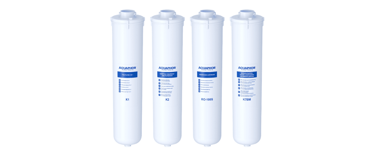 Set of four white filters with aquaphor branding on a white background