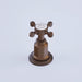 Bronze hot tap handle with white ceramic cap engraved with ‘HOT’