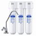 AquaPhor under sink water filter system with three white filter cartridges labeled K3, K2, and K7, a curved chrome faucet spout, and a three-hole mounting cap on a white background.