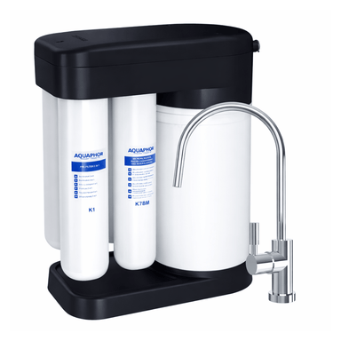 Under sink Water filter system with three cylindrical filters and a chrome faucet on a white background