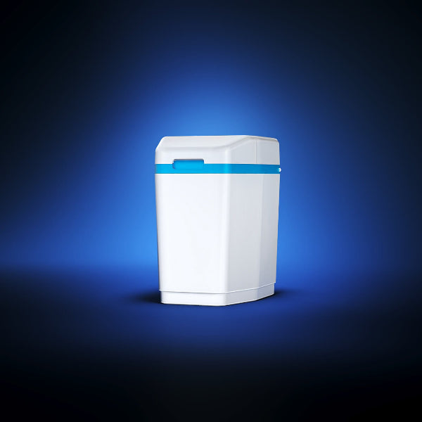 Aquaphor S550 compact water softener system with blue trim on dark background