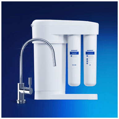 Aquaphor RO-101S system installed under kitchen sink with modern tap