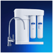 Aquaphor RO-101S system installed under kitchen sink with modern tap