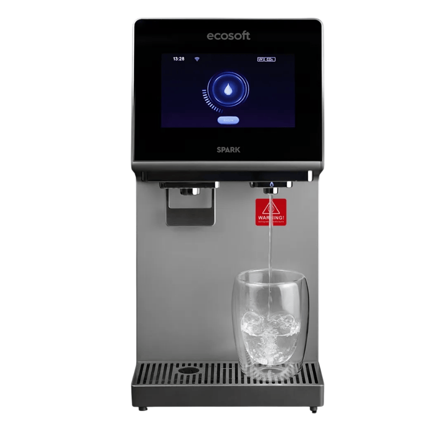 Ecosoft water dispenser with digital display and glass of water on a white background