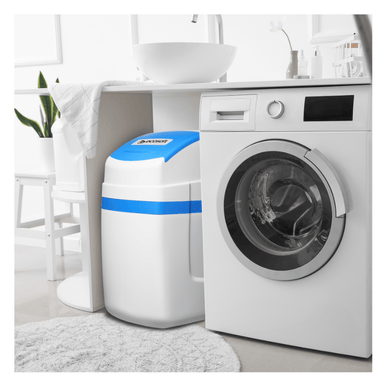 Home water softener system next to a washing machine
