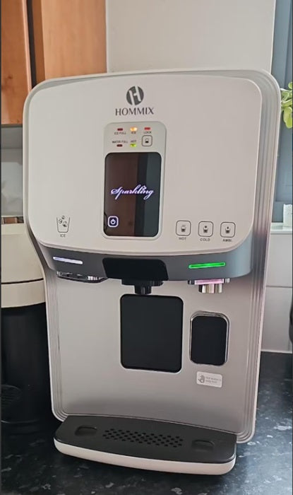 a countertop dispenser installed on a kitchen surface