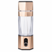 A hydrogen water bottle in gold with a clear jar and Osmio brand name