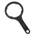 A black plastic water filter spanner with a textured handle, shown on a solid white background.