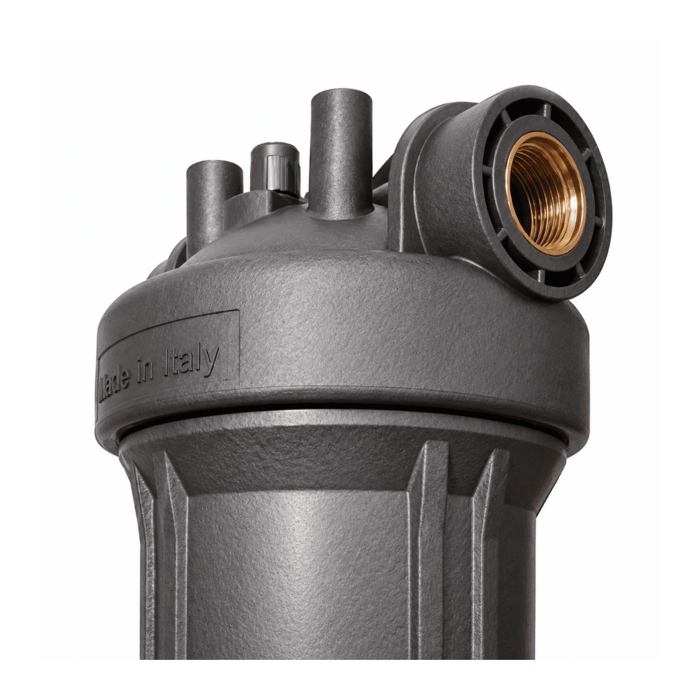 A close-up of a dark gray whole house water filter system with a brass threaded fitting on the side, shown against a plain white background.