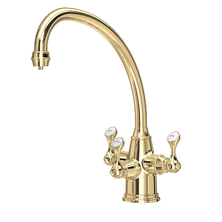 Brushed brass three-lever kitchen tap with curved spout and white top handles