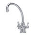 Chrome three-lever kitchen tap with curved spout and white ceramic handles