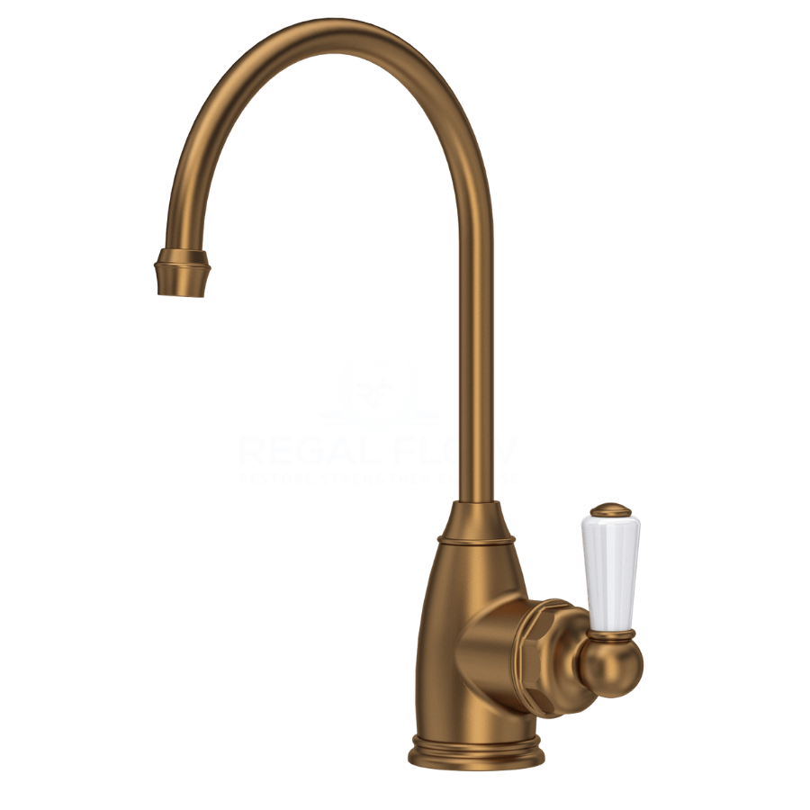 Bronze instan hot kitchen faucet with white handle on a white background
