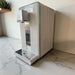 Ayus Wellness countertop RO water purifier with modern white finish on worktop