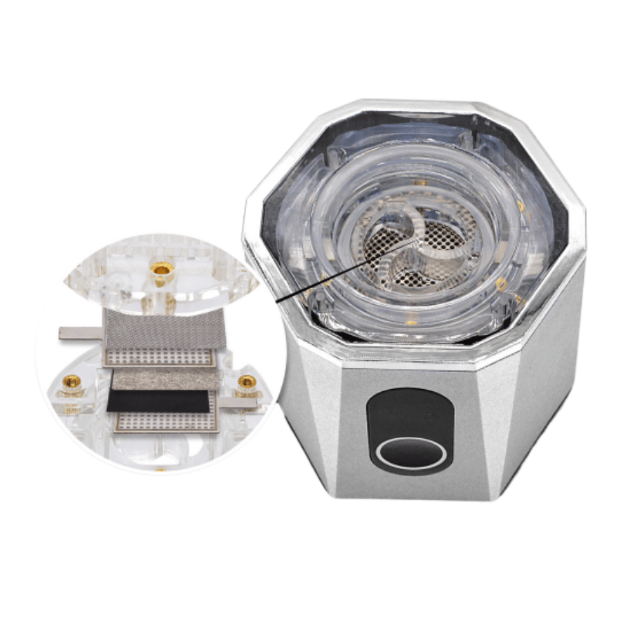 Close-up of a Hydrogen Water device with intricate internal components on a white background